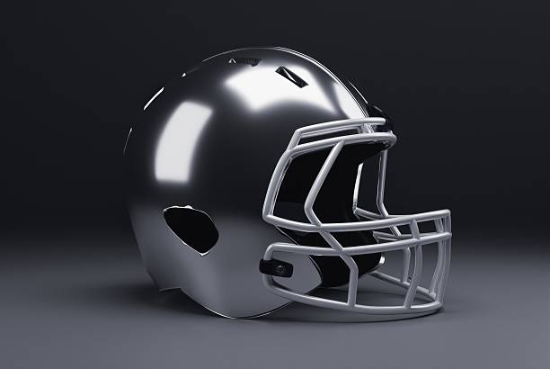 istock The silver American football helmet is presented in a static display. 2248826620