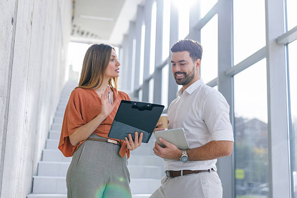 istock Business colleagues collaborating on project in modern office 2248826978