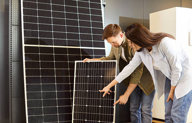 istock Family Couple Selecting Solar Panels in a Store 2248830423