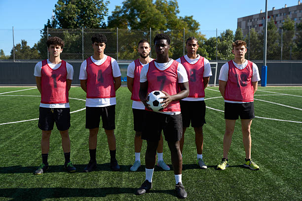 istock Diverse men soccer team training on football field 2248830527