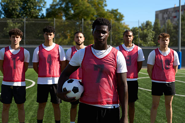 istock Diverse male soccer team posing on field 2248830535