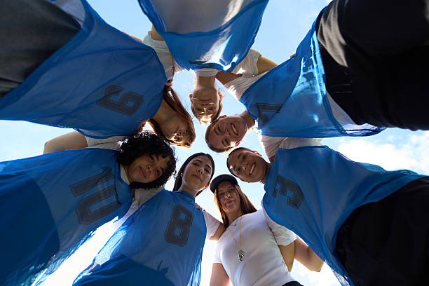 istock Women's soccer team huddling together for motivation 2248830632