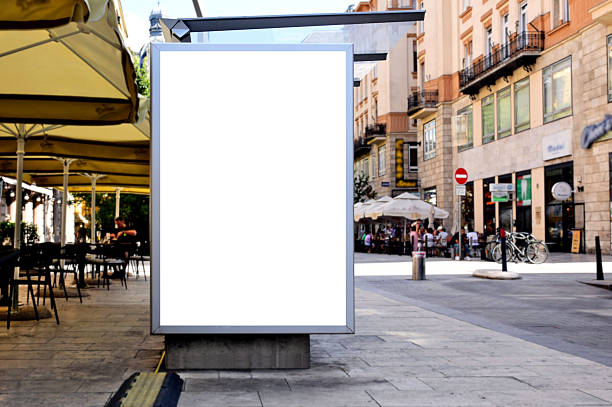 istock blank billboard, ad lightbox along sidewalk. urban outdoor advertising sign panel mockup 2248835614