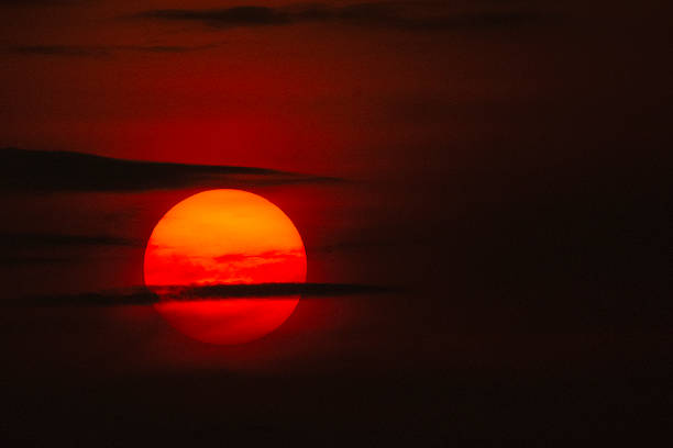 istock Golden Sunset Sky with Dramatic Clouds and Warm Radiant Light 2248836792