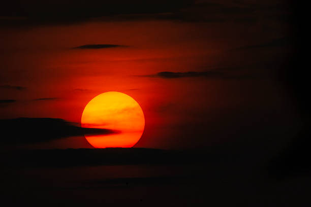 istock Golden Sunset Sky with Dramatic Clouds and Warm Radiant Light 2248836798
