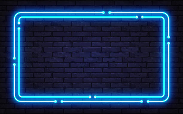 istock Glowing blue neon frame with circuit-style lines on a dark brick wall. Futuristic cyber design perfect for tech ads, banners, or digital themes. 2248837807