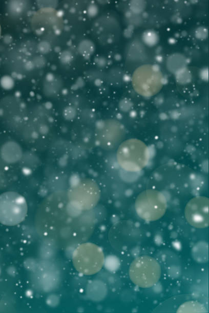 Vertical Christmas background in green, with snow and lights