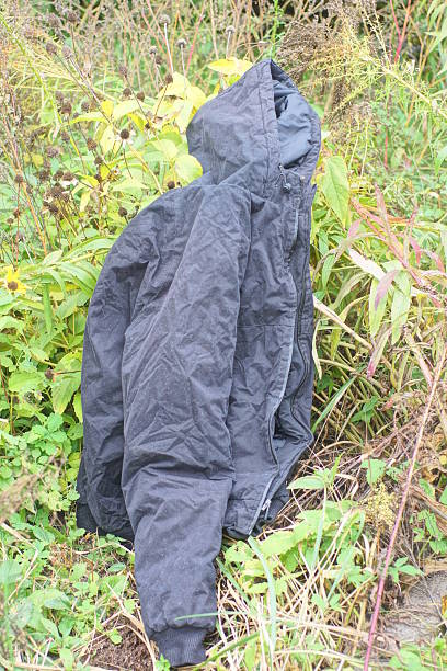 istock one black winter fabric jacket lies on the ground 2248849892