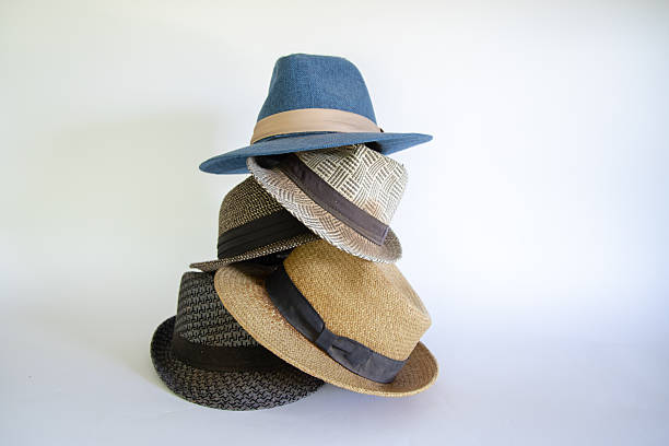 istock Five piled up stylish straw hats for men 2248850431