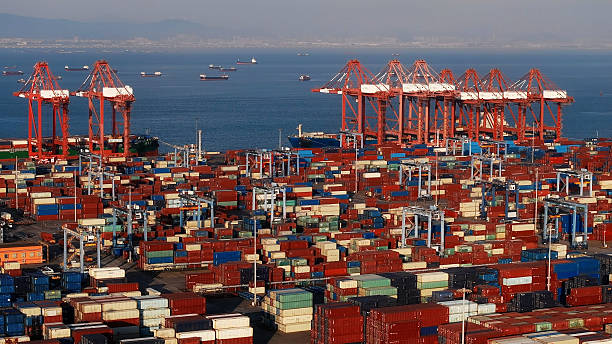 istock Lot big boxes rows, ship delivery ocean harbor. Cargo containers seaport freight 2248850480