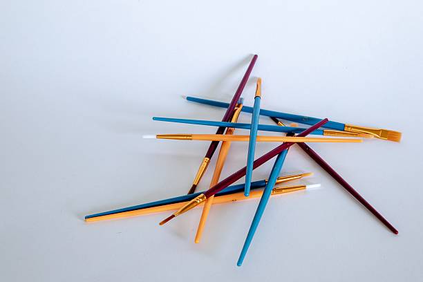 istock A pile of multi coloured paint brushes lying on top of each other in a random pattern 2248850909