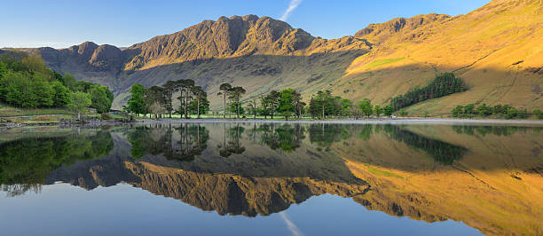 istock Panoramic View Of Buttermere Lake Reflections With Haystacks Mountain, Lake District, UK. 2248852889