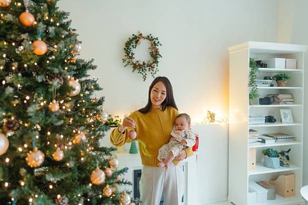 istock First Christmas with my baby 2248860642
