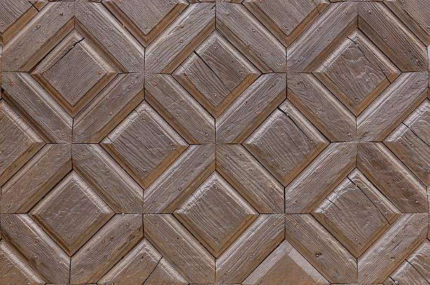 Brown wooden wall with square honeycomb patterns as a background