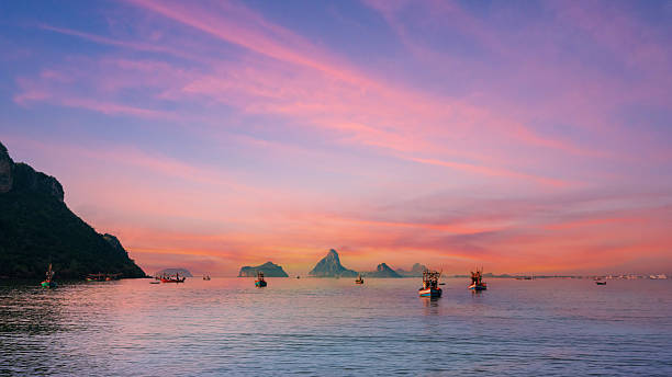 istock Boat on the sea at sunrise sky background 2248865104