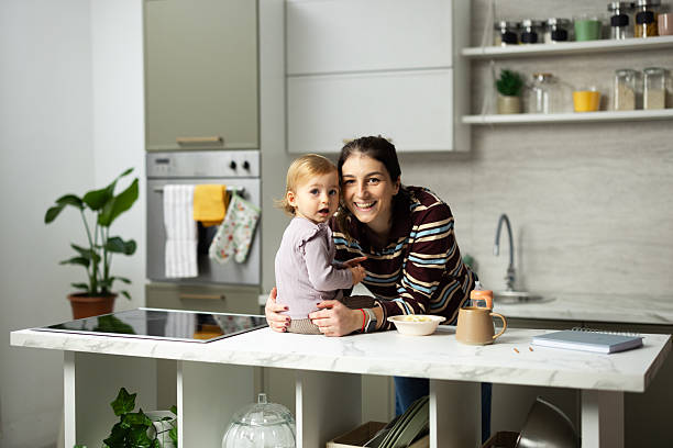 istock Mother and baby enjoying quality time in kitchen 2248865980