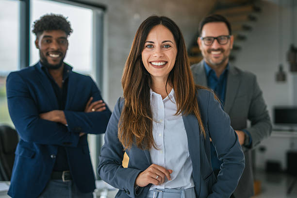 istock Diverse business team smiling with crossed arms in office 2248869735
