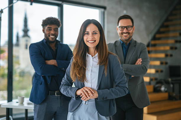 istock Diverse business team smiling with crossed arms in office 2248869969