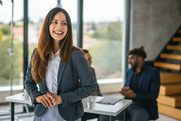 istock Professional businesswoman smiling confidently in modern office setting 2248870742
