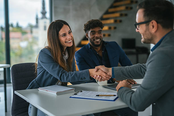 istock Businesswoman shaking hands with client after successful meeting 2248870811