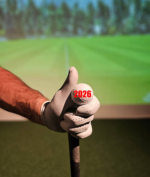 istock Golfer prepares to swing while using a simulator in indoor golf facility during evening hours in 2026 concept 2248871810