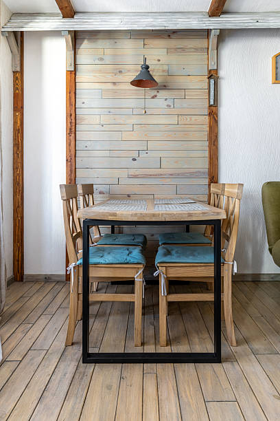 istock Cozy Dining Area with Wooden Table and Chairs in Rustic Interior 2248877518