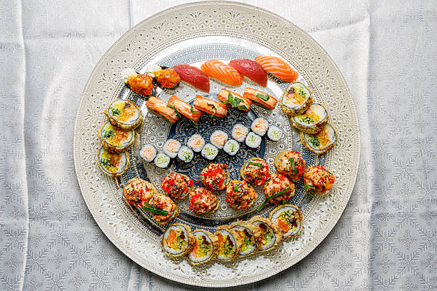 istock Large sushi set on a beautiful plate on a light background isolated 2248877799