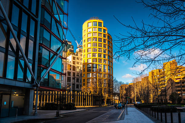 istock Modern and old buildings standing together in london's financial district 2248877803