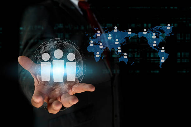 istock Businessman holding global structure customer network. Human resource management technology (HR), Hiring Human Resources. headhunting and recruitment process. 2248885292