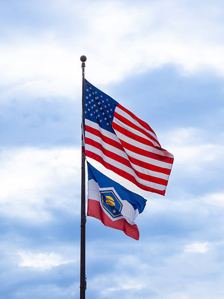 istock American flag and Utah state flag flying together on the same pole 2248887252
