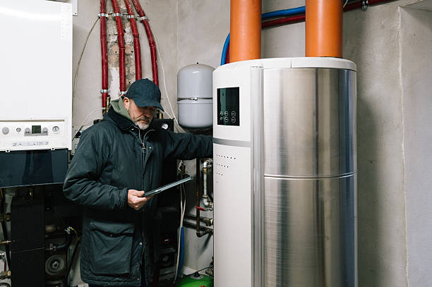 istock A building technician inspects the heating system of a residential building 2248890718
