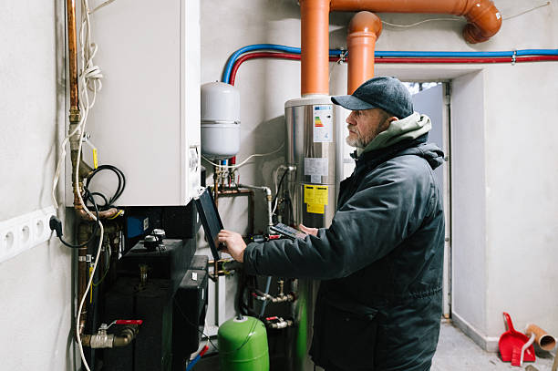 istock A building technician inspects the heating system of a residential building 2248890805