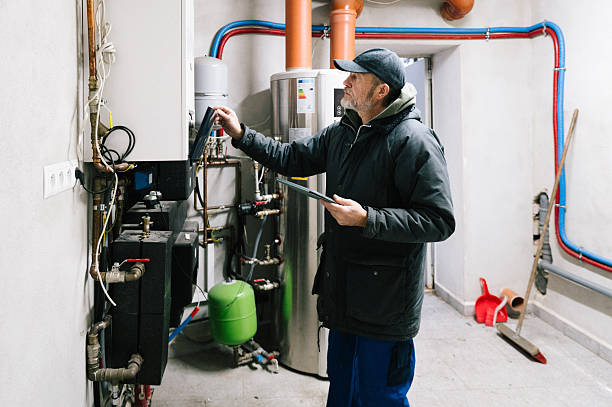 istock A building technician inspects the heating system of a residential building 2248890829