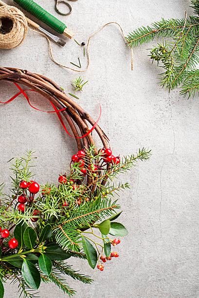 istock Making Christmas wreath from natural branches 2248891760