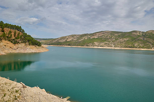 istock Wide view of reservoir and mountain range 2248891834