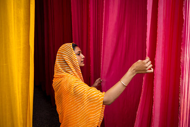 istock Textile Draper Among Vibrant Fabrics, Jaipur, India 2248891843