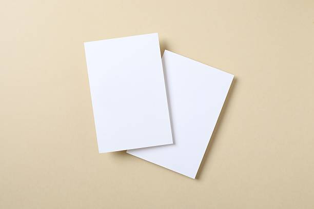 istock Two white paper cards on beige background 2248892913