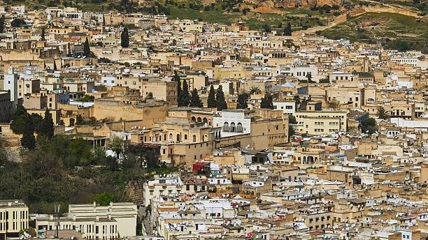istock Dense mediterranean cityscape with terraced buildings and greenery 2248902612