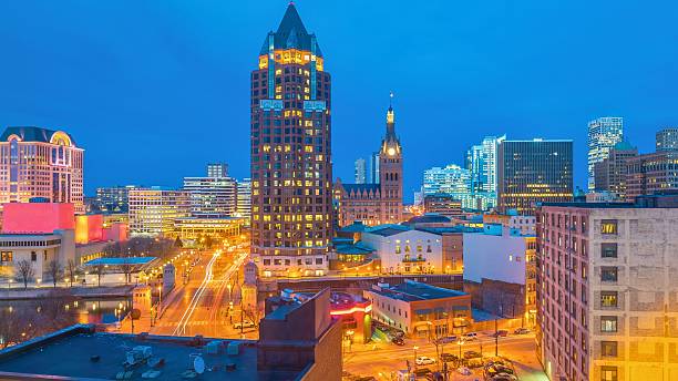 istock Illuminated downtown cityscape at dusk with tall buildings 2248903085