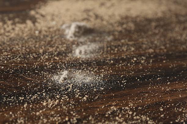 istock Wooden table covered with dust, closeup view 2248911019