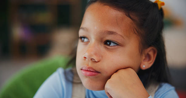 istock Thinking, student and decision with child in home for brainstorming, math solution and vision. Reflection, problem solving and education mindset with girl in house for studying, curious and memory 2248915117