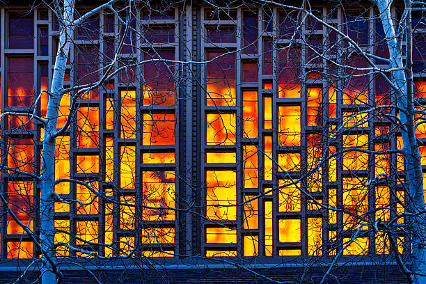 Backlit colorful stained glass detail.