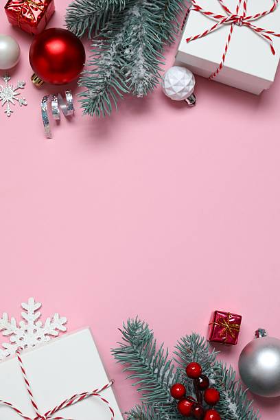 istock Beautiful frame with gift boxes on pink background, Christmas concept 2248918326