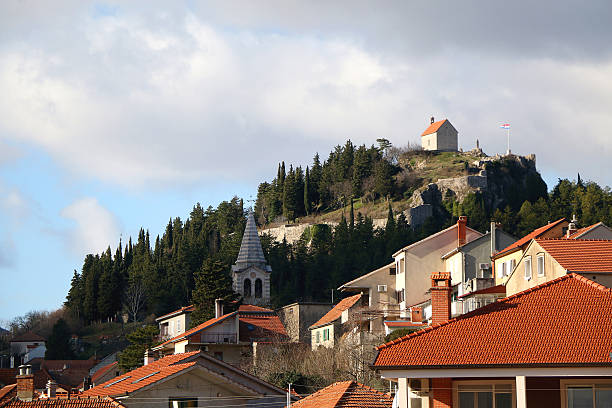 Aerial view of Sinj, small town in southern Croatia.  Light snow falling on the town.