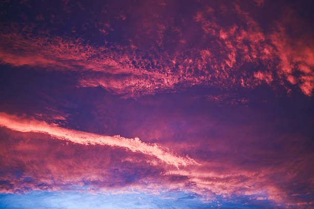 istock Vibrant purple sky with dramatic colorful sunset clouds 2248919886