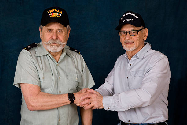 istock Retired Army Colonel and Coat Guard Veteran greeting 2248923567