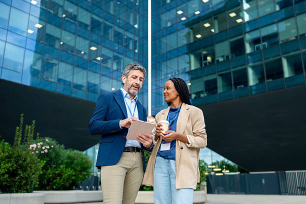 istock Business colleagues discussing work information on a tablet 2248923827