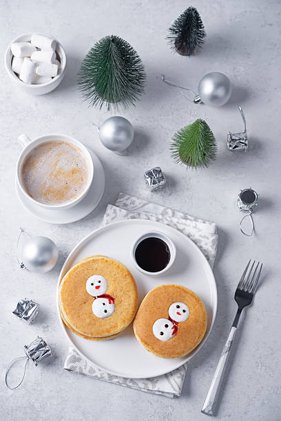 istock Pancakes with marshmallow snowmen in a plate for Christmas holidays 2248924985