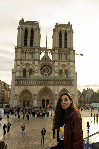 istock posing in front of the Notre‑Dame Cathedral 2248925226