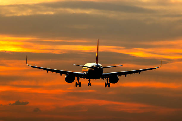 istock Aircraft landing at sunrise 2248927895